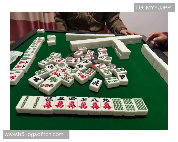 梦见玩麻将胡了-麻将桌上的梦—我胡了！梦见玩麻将胡了